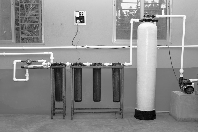 Sulabh Safe Drinking Water project in Arsenic-Affected Areas - The indoor main purification unit comprising an activated carbon filter, graded cartridge filters and an UV filter at village Madhusudankati, North 24 parganas district, West Bengal